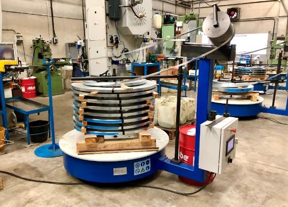 LARA Coiling Equipment DHP Series in a metal production system with multiple coils in a horizontal position.