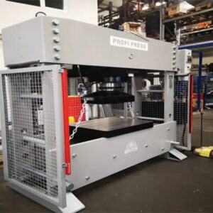 300-ton hydraulic press with light curtain photo cells and mesh side curtains for enhanced operator safety.
