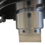 Durable piston end cap secured to piston with grub screws for metalwork.