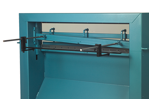 Back view showing the material backstop of the SCANTOOL TSM foot-operated guillotine shear.