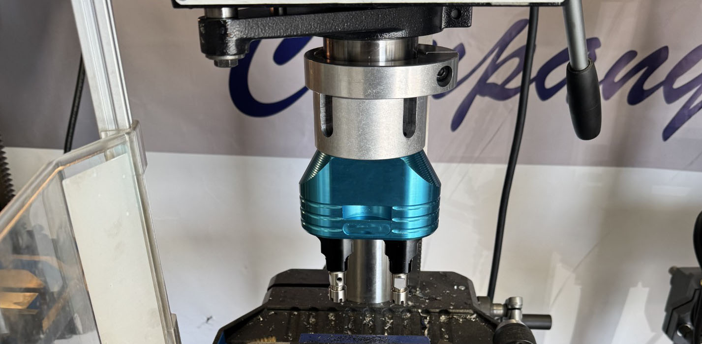 Dual drilling head mounted on a pillar drill for precision multi-hole operations