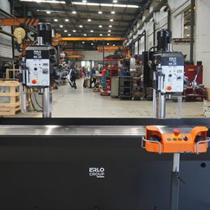 Front view of ERLO 2SE.25 twin-head gang drill with long T-slotted worktable