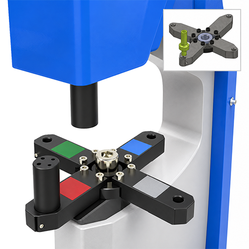 Four-station rotary tooling turret fitted to a fastener insertion machine, with a standalone turret inset